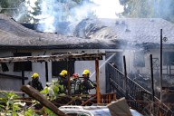 PHOTOS: House burns on Surrey-Delta border, neighbours report explosion
