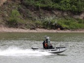 Why do some Edmonton river-goers take life jackets but fail to wear them?
