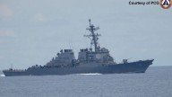 US briefly deploys 2 warships to a disputed South China Sea shoal after Chinese collision