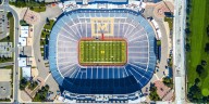 Punishments announced for Michigan football program for sign