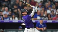 Rockies rough up Ohtani in his 1st start at Coors Field and beat Dodgers 8