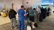 United Airlines resolves tech issue that grounded flights, but travel disruptions continue