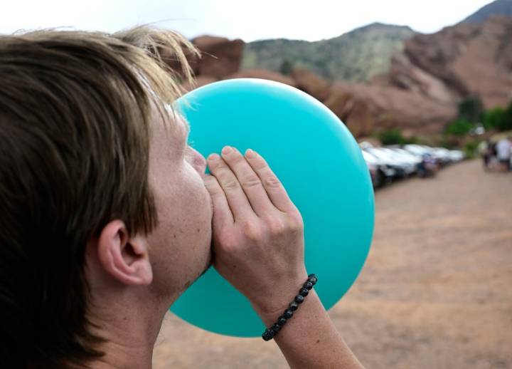 A common sight at concerts, nitrous oxide abuse is soaring, prompting health concerns