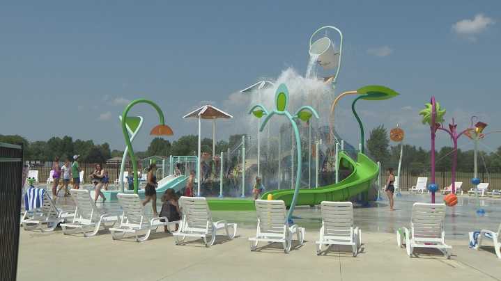 Families beating the heat at local pools and splash pads