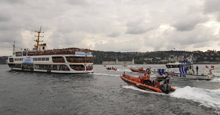 Turkish authorities search for a Russian swimmer who went missing in cross