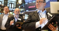Stocks add a bit to their records on Wall Street