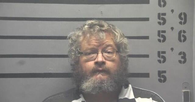 Madisonville man arrested for pointing loaded handgun at a victim in a business Thursday