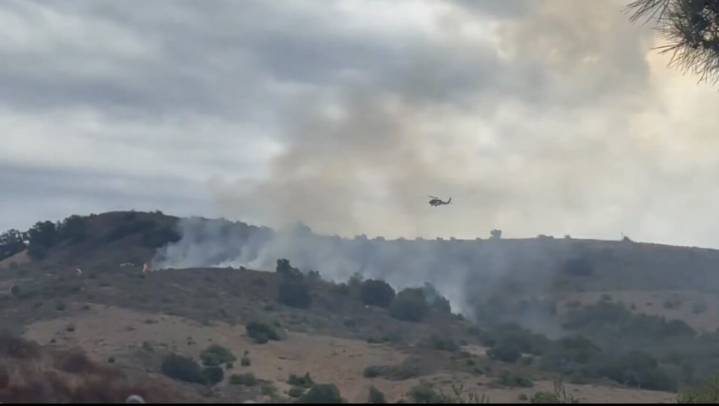 Lightning sparks brush fire in Trabuco Canyon as thunderstorm moves through region