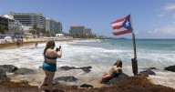 Hurricane Erin weakens to Category 3 as forecasters wait for northward turn