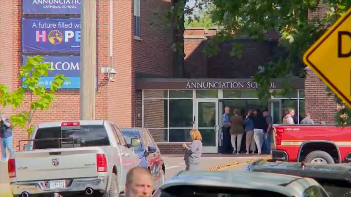 Minneapolis Catholic schoolchildren listened to a prayer, then ducked for cover from gunfire