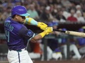 Diamondbacks take 6-5 victory over Reds in the 11th