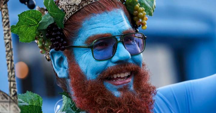 Saturday's sweaty Uptown parade satirizes recent jailbreak with the theme 'To Easy LOL'