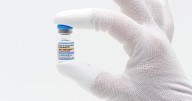 FDA approves updated COVID-19 shots but limits access for some kids and adults