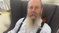 The Melbourne butcher’s son who converted to Judaism and guided 10,000 lives to death