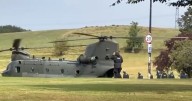 Firearms officers board Chinook helicopter for exercise at Edinburgh Murrayfield