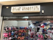 What impact have tariffs had on a Montgomery County shoe store?