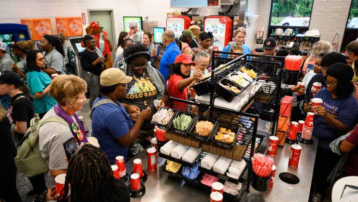 Watch as Fayetteville celebrates the opening of the city's first Wawa