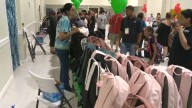 Warren Family Mission hands out backpacks, supplies for upcoming school year