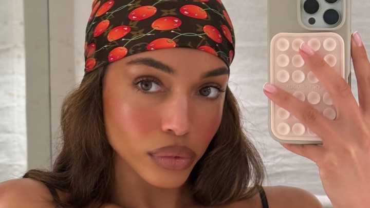 Lori Harvey stuns in busty black bikini for mirror selfie on extravagant trip to Ibiza