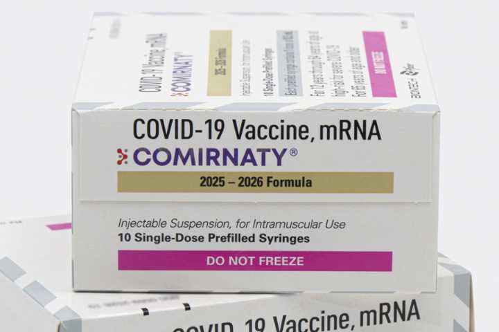 FDA approves updated COVID-19 shots but limits access for some kids and adults