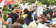 Hundreds show up at the CDC to clap out resigning doctors