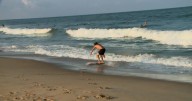 Surfers chase waves in VB as officials warn of rip currents from Hurricane Erin