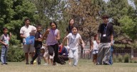 With "1950s summer camp," Denver volunteers engage migrant kids as families fear separation, deportation