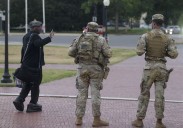 Some National Guard units in D.C. now carrying firearms as Trump targets more cities