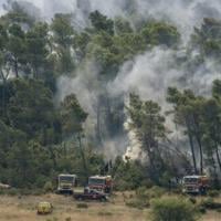 French firefighters optimistic after controlling vast wildfire