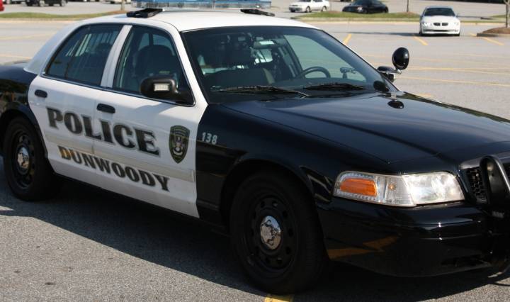 Dunwoody officer on administrative leave accidentally discharges weapon while handing over guns