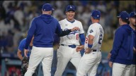 Shohei Ohtani gets first victory with Dodgers, striking out season