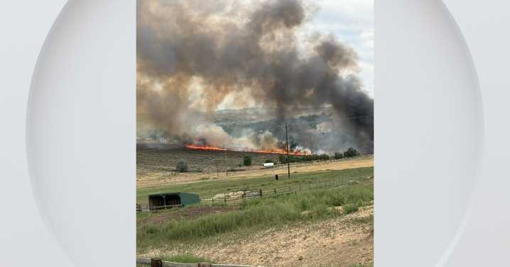 Western Colorado city temporarily evacuates neighborhood due to wildfire, extended outage expected