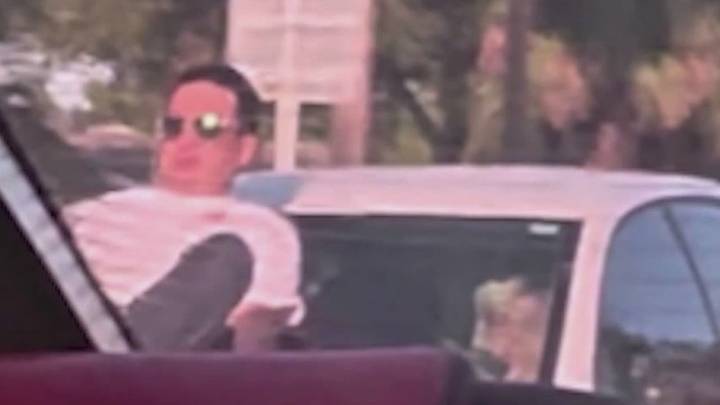 Florida man clings to hood of car speeding down road, drivers watch in horror: 'Really scary'