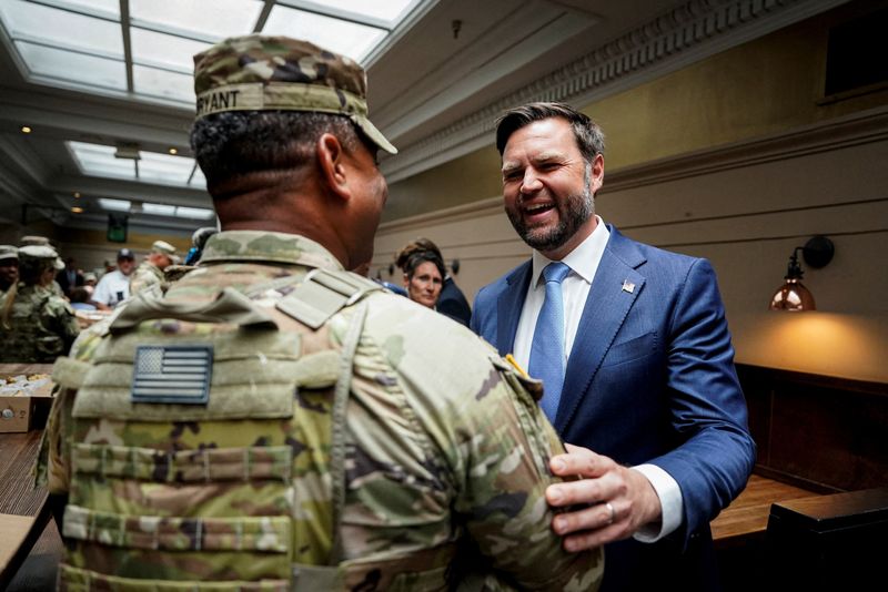 Vance, Hegseth greet troops in Washington, face jeers from protesters