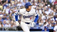 Shohei Ohtani gets first victory with LA Dodgers, striking out season