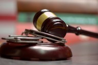 Man accused of pointing gun at neighbors appears in court
