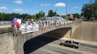 Smith County group protests Trump, redistricting on Tyler overpass