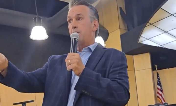 'Who pays?' GOP rep exits through back door after constituents hound him over Trump policy