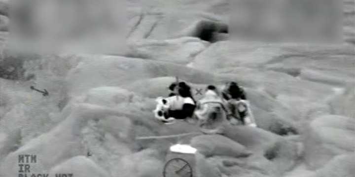 VIDEO: Coast Guard rescues 4 children stranded on rock on Lake Superior