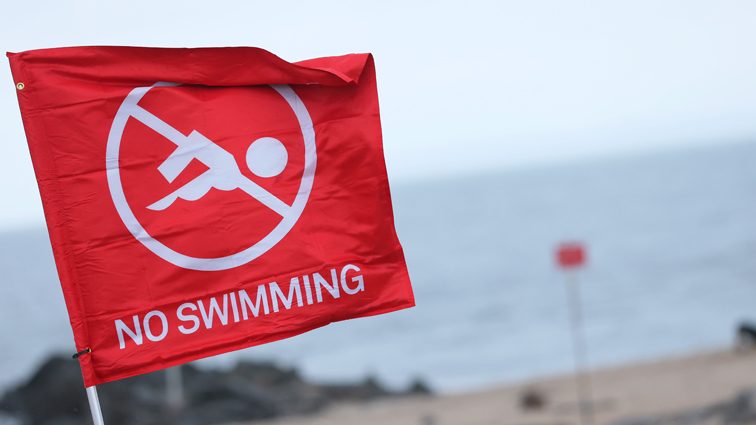 Hurricane Erin churns up dangerous waves and closes beaches along US East Coast
