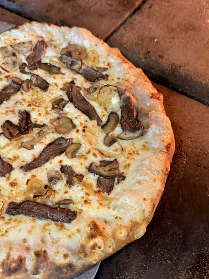 The Western Reserve serves savory steak, wood-fired pizza in downtown Muskegon