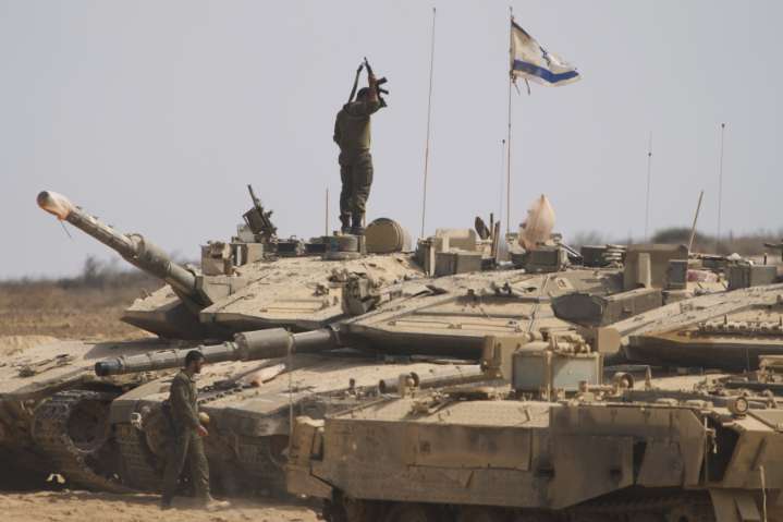 Israeli gunfire kills at least 25 in Gaza as Netanyahu says he will allow Palestinians to leave