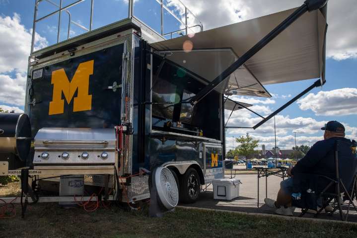 Trailer tailgaters ‘bleed maize and blue’ for Michigan football’s season opener