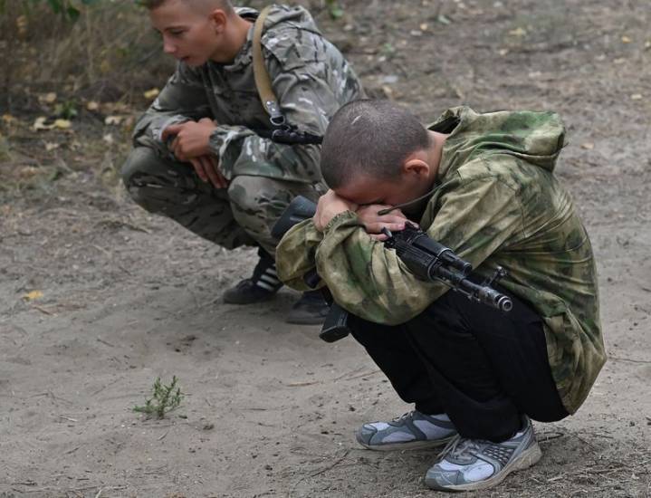 ‘We threw hand grenades!’ Russian kids as young as 8 get taste of military training
