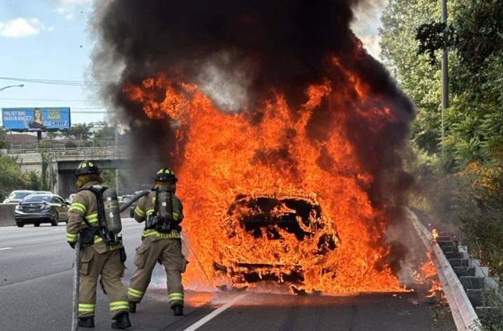 PHOTOS: No injuries after car catches fire on I
