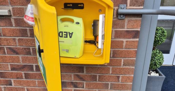 Wishaw opticians helps restore defibrillator back to lifesaving service at veterans' hub