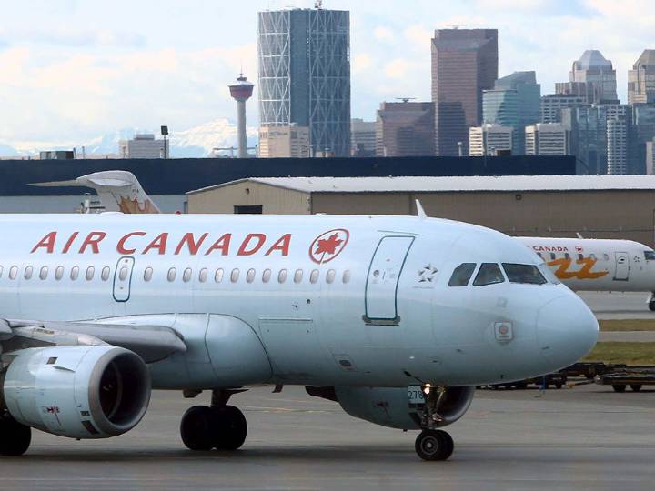 Air Canada flight attendants vote in favour of strike mandate