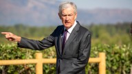 Powell indicates conditions 'may warrant' interest rate cuts as Fed proceeds 'carefully'