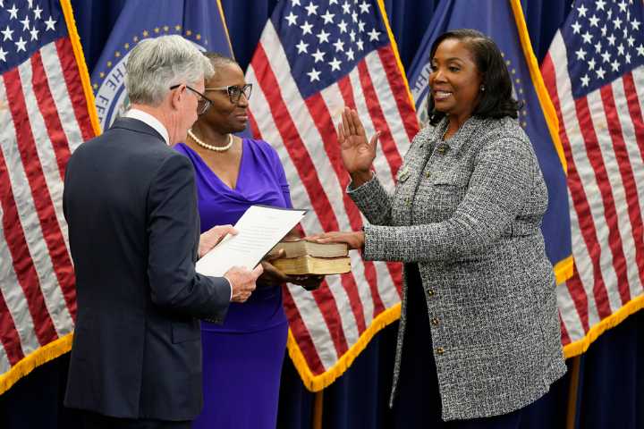 Fed official sues Trump over attempt to fire her, challenging his power over the independent agency