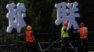 China's economy lags in July under pressure from tariffs and a weak property market
